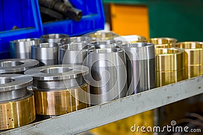 Hydraulic piston and cylinder on a rack in a warehouse Stock Photo