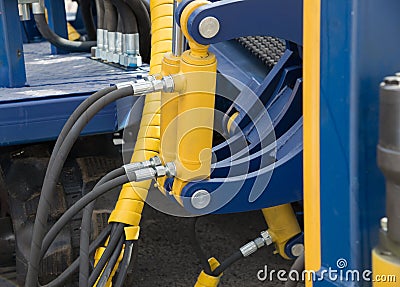 Hydraulic pressure pipes and piston system Stock Photo