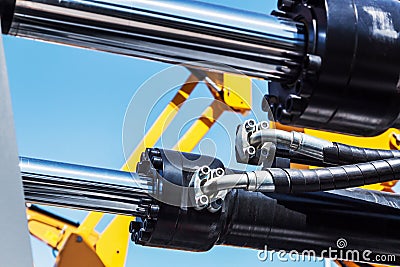 Hydraulic system of tractor or excavator. Details and parts Stock Photo