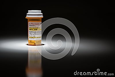 Hydrocodone Pills and Prescription Bottle with Non Proprietary Label Stock Photo