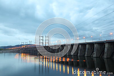 Hydroelectric power station at cloudy evening Stock Photo