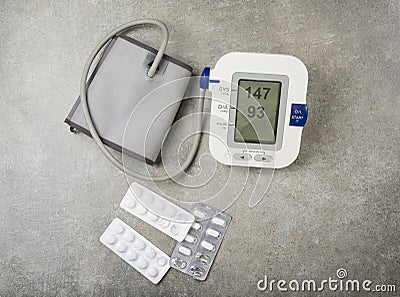 Hypertension concept. High blood pressure with used tablets and pills. Stock Photo