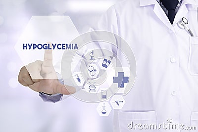 Hypoglycemia Professional doctor use computer and medical equipment all around Stock Photo