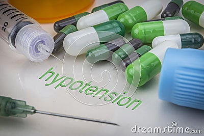Hypotension, medicines and syringes as concept Stock Photo