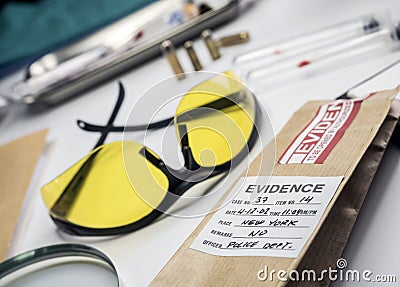 Hypothetical evidence bag with sample of a murder in a crime lab Stock Photo