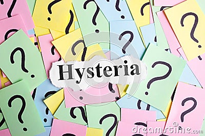 Hysteria Syndrome text on colorful sticky notes Against the background of question marks Stock Photo