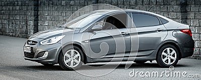 Hyundai accent in grey color 2014, left side view Editorial Stock Photo