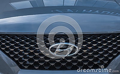 Hyundai Logo Close-up On Car Bumper Or Grill. Hyundai Automobile Manufacturer Editorial Stock Photo