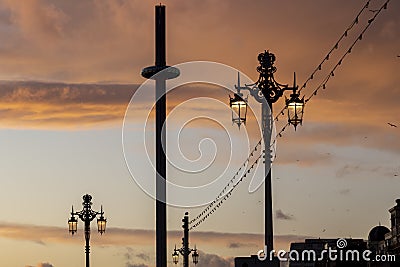 I360 in Brighton at sunset with seagulls Stock Photo