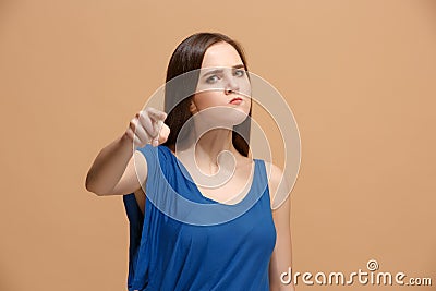 The overbearing woman point you and want you, half length closeup portrait on pastel background. Stock Photo