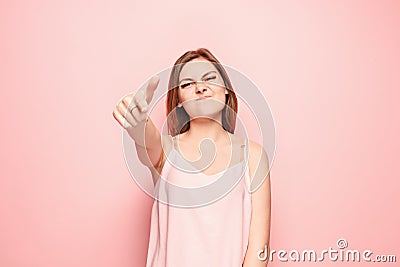 The overbearing woman point you and want you, half length closeup portrait on pink background. Stock Photo