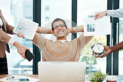 I do my best when the heat is on. a young businessman looking calm in a demanding office environment. Stock Photo