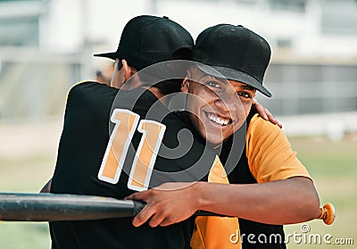 I do my best for my team. two young baseball players embracing each other while out on the pitch. Stock Photo