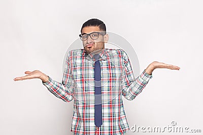 I don`t know. confused bearded businessman in checkered shirt, b Stock Photo