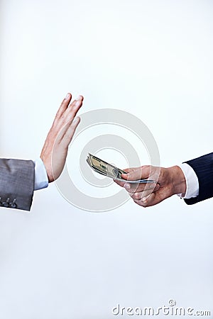 I dont think so. a businessman refusing a bribe thats been offered to him. Stock Photo