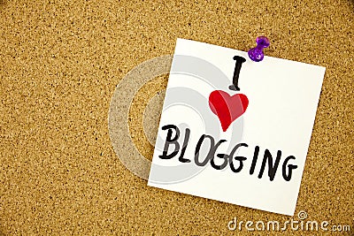 I love my Blogging written on white signboard pinned to a cork notice board Stock Photo