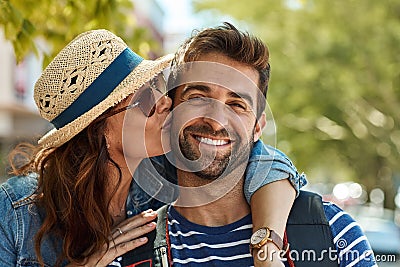 I love two things travel and you. Portrait of a happy tourist couple enjoying the sunshine in a foreign city. Stock Photo