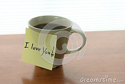 I love You! note on steaming cup of coffee in morning light Stock Photo