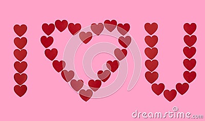 I love you in red heart shaped paper confetti with blank pink background Stock Photo