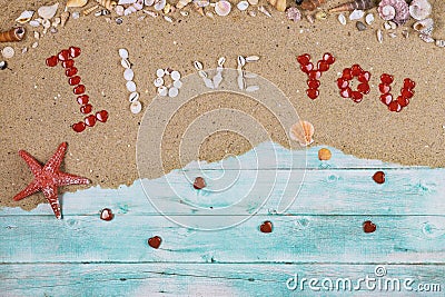 I love you taxt made from sea shells with red starfish Stock Photo