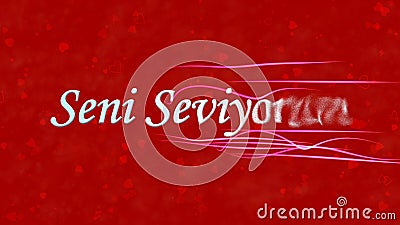 I Love You text in Turkish Seni Seviyorum turns to dust from right on red background Stock Photo