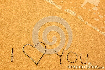 I Love You - written by hand in sand on a beach. Stock Photo