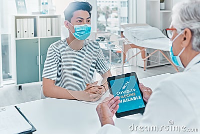 I recommend you get your vaccine. a young man sitting with his doctor and enquiring about a Covid vaccine during his Stock Photo