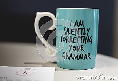 `I silently correcting your grammar` coffee mug Stock Photo