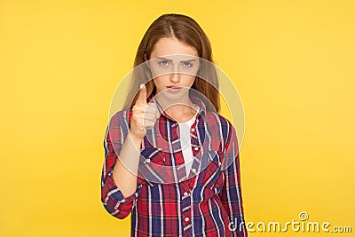 I told you! Portrait of angry ginger girl in checkered shirt looking at camera and blaming warning you with raised finger Stock Photo