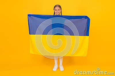 I am ukrainian and proud of it. Patriotic education. Happy independence day. Kid hold ukrainian flag. Patriotism love Stock Photo