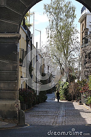 The archway leads the way to the residences in the area. Editorial Stock Photo