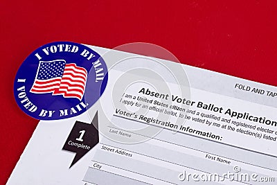 `I Voted By Mail` sticker and Absentee Voter Application Vote by Mail Form Stock Photo