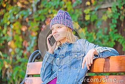 I am waiting for you in park. Girl busy with smartphone green nature background. Woman having mobile conversation. Girl Stock Photo