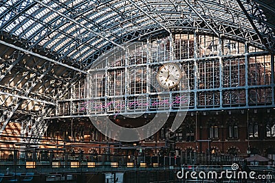 `I want my time with you` glowing pink letters installation by Tracey Emin inside St. Pancras Station, London, UK. Editorial Stock Photo