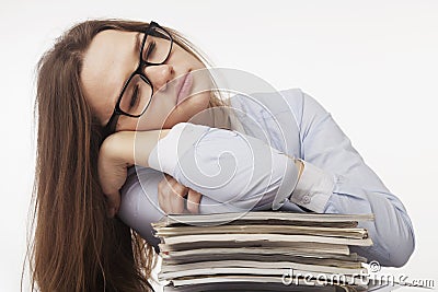 I want to sleep. Young business woman tired from office work wit Stock Photo