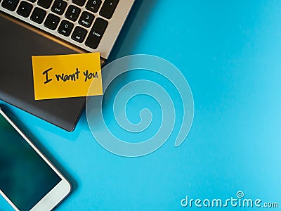 I want you to be a message in the note on the blue background Stock Photo