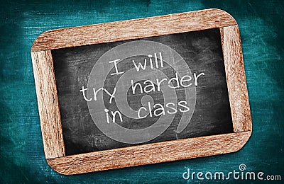 I will try harder in class written on a blackboard / intention c Stock Photo