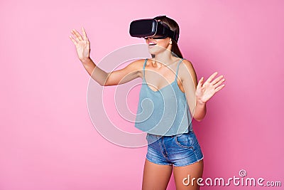 I wish could go mystery road. Cheerful enthusiastic girl wear vr-box walk copyspace hold hands try search route virtual Stock Photo