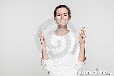 I wish some cool. Young beautiful girl closed eyes and crossed f Stock Photo