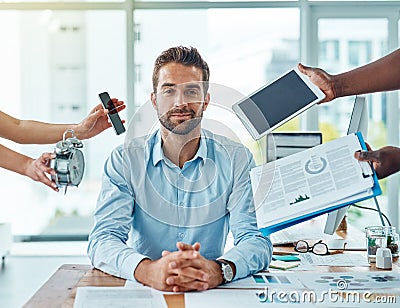 I wont let the pressure get to me. Portrait of a young businessman looking calm in a demanding office environment. Stock Photo