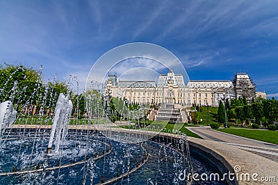 IASI, ROMANIA - 23 MAY 2015: Iasi Cultural Palace being restaurated with a beautiful green park on a sunny spring day with Stock Photo