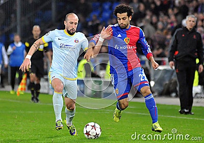 Iasmin Latovlevici and Mohamed Salah pictured during UEFA Champions League game Editorial Stock Photo