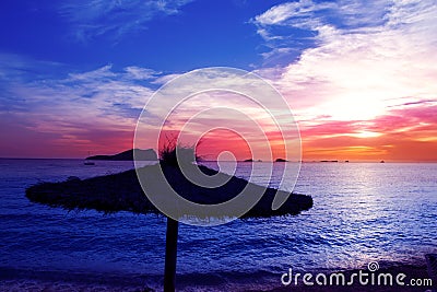 Ibiza sunset in cala Conta Conmte Stock Photo