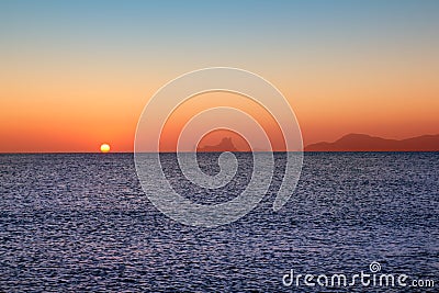Ibiza sunset from Formentera with Es Vedra Stock Photo