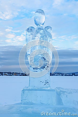 Ice angel in winter. Epiphany Orthodox holiday on a place of ice-hole swimming Stock Photo