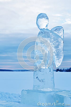 Ice angel in winter. Epiphany Orthodox holiday on a place of ice-hole swimming Stock Photo