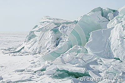 Ice background of huge blocks of aqua ice from fractured floes. Stock Photo