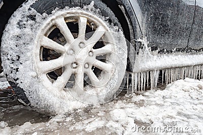 Ice buildup and icicles on a car Stock Photo