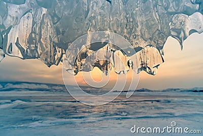 Ice cave with sunset, Baikal water lake Russia Stock Photo