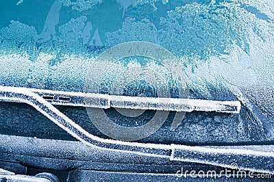 The ice-cold frost forms ice crystals in beautiful unique patterns on the Car Stock Photo